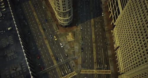 Urban Hub Vibrancy Captured Above Bustling City Intersections in Sunlight