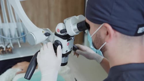 Close Up Dentists with Medical Mask Holds Use Special Dental Equipment That Treats Teeth Hydience