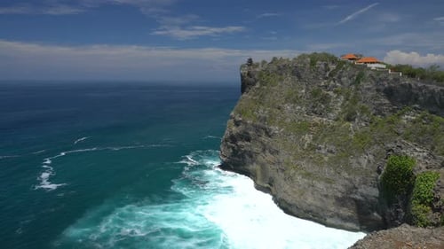 Ocean Waves Splashing Over Volcanic Rocky Shore