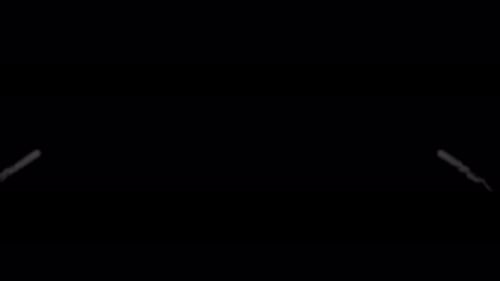 Smoke fills the space from the center of the frame against a black background.