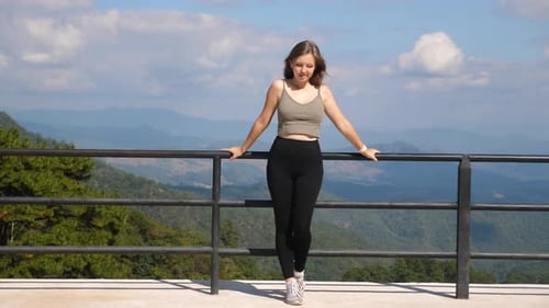 Young Millennial Traveler Enjoy Mountain Valley View on Viewpoint