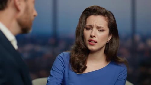 Host Looking Man Guest with Compassion Listening Sad Story in Tv Show Close Up