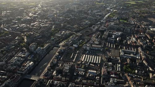 Dublin, Ireland, Cinematic Aerial View of Downtown, Cityscape and Buildings by Liffey River on Sunny