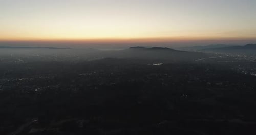 Aerial view of Los Angeles skyline at sunset, California, United States.