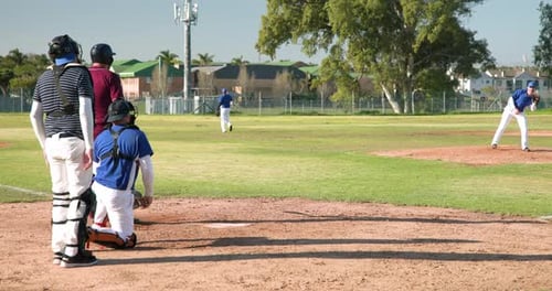 Baseball Game Action on a Sunny Day