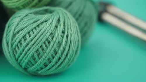 Creating with Green Yarn and Knitting Needles for Beginners