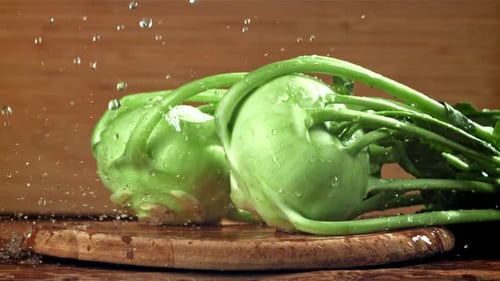 Drops of Water Fall on the Kohlrabi Cabbage Filmed on a Highspeed Camera at 1000 Fps