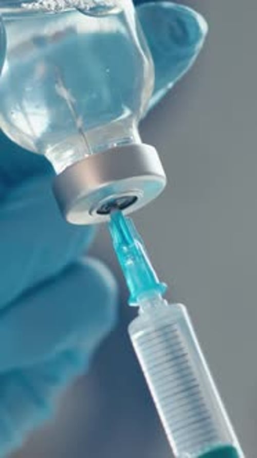 Syringe Draws Liquid from Vial, Medical Research