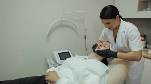 Woman Receives Facial at Medical Spa From Professional