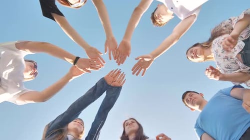 Young People Putting Their Hands Together for Unity
