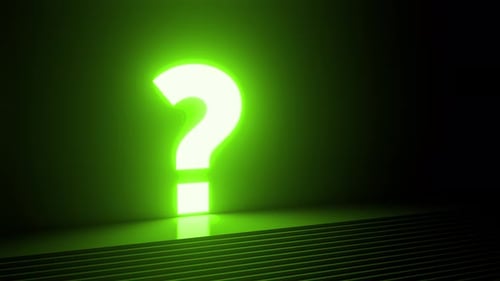 Glowing green question mark appearing in dark room