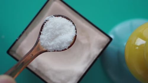 Top View of Spoon Pick Salt in a Bowl