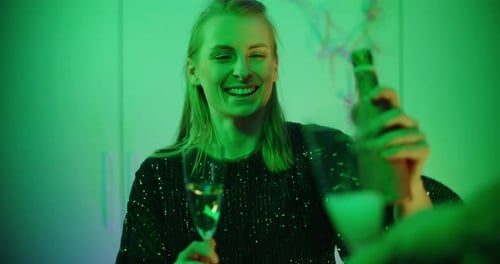 Happy Woman Holding Champagne Glass Smiling