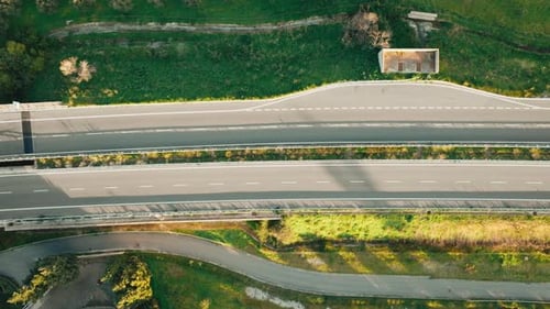 Overhead of a Highway with Little Car Traffic and Green Transport in Europe
