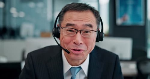 Happy, man and headset with face at call centre of customer service, telemarketing advice