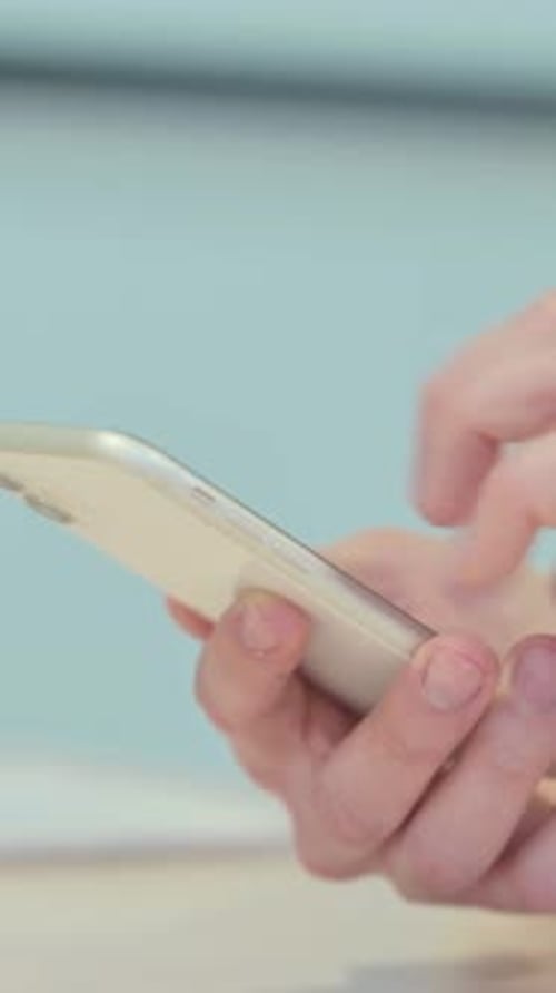 Close up of Man Using Smartphone