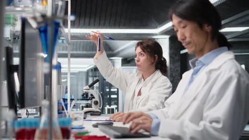Scientists Working in Modern Research Laboratory