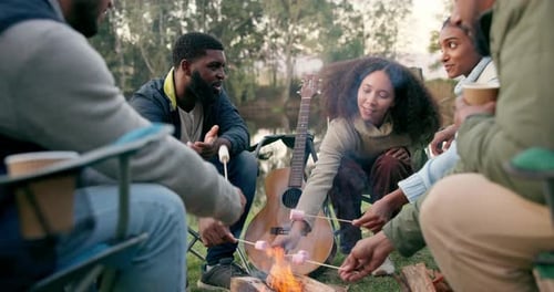 Camping, fire and people with marshmallow in nature for holiday, vacation and adventure in woods
