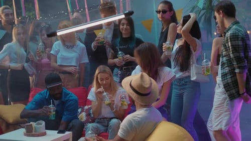 Friends Gather at a Lively Party Sharing Laughter and Joy