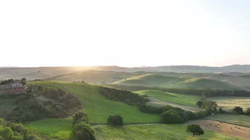 Aerial video on the hills of Tuscany in San Quirico, Belvedere view at sunrise - Tuscany