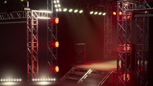 Dynamic Concert Stage with Vibrant Moving Spotlights