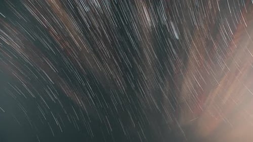 Abstract Star Trails in Dark Blue Sky