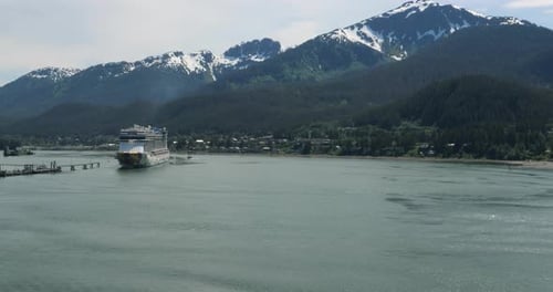 Cruise ship approaching the port of Juneau, Alaska.Mount Bradley on Douglas Island in the background