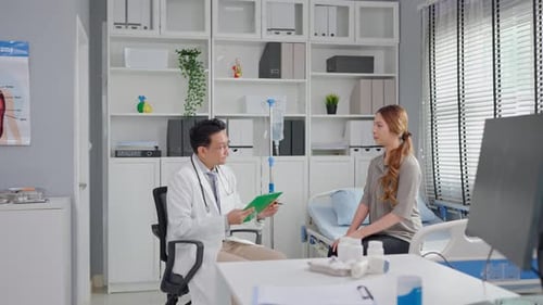 Asian young woman visit and consult health problem with doctor in hospital.