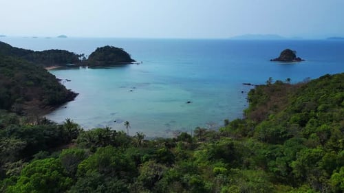rainforest on tropical island beach bay. Fabulous aerial view flight drone