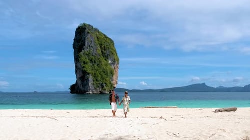 Koh Poda Krabi Thailand an Asian Woman and a European Man on a Beach in Thailand