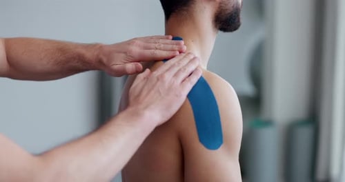 Physiotherapy, shoulder strap and man patient with sport massage therapist and arm injury at clinic
