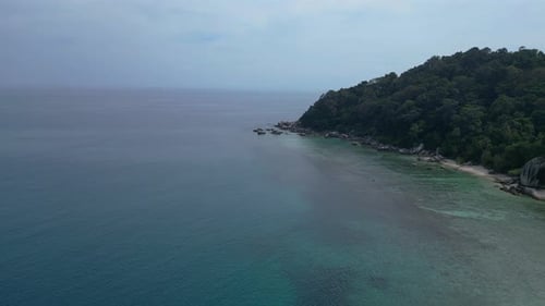 headland beach at granite rocks island, turquoise water. Fantastic aerial view flight drone