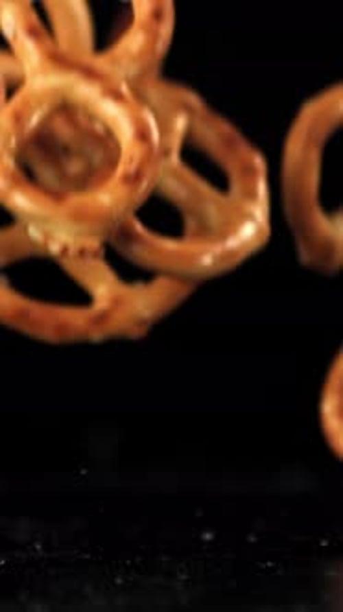 Salted Pretzels Fall on the Table Filmed on a Highspeed Camera at 1000 Fps