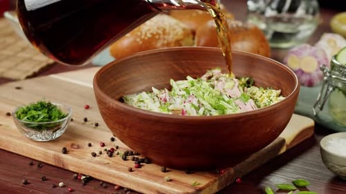 Pouring Kvass Into Salad Closeup Cooking Okroshka Summer Cold Soup Traditional Russian Cuisine