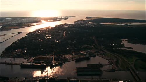 mouth of the river, the view against the evening sun, the port city from above