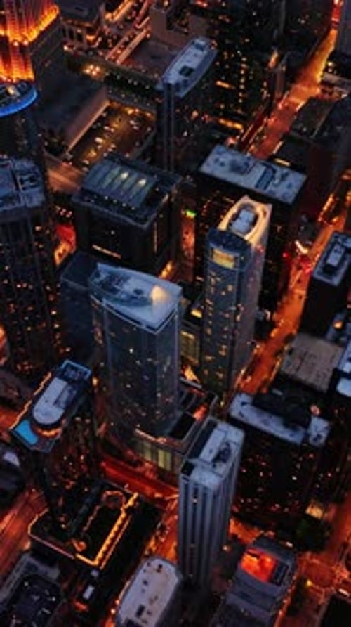 Stunning aerial view of Chicago's skyline illuminated at night
