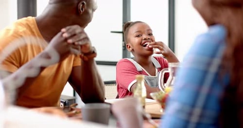 Family Eating and Talking Together at Home