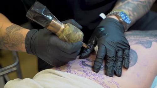 Close up of a tattoo artist working 4K