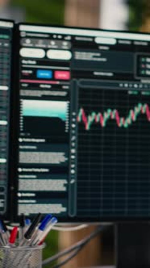 Vertical Video Close Up of Stock Exchange Metrics Candlestick Charts Displayed on Monitors