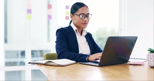 Laptop, office and professional woman typing feedback report, business project review