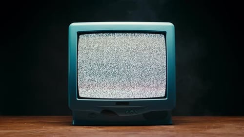 Vintage Television Displaying Static with Rising Fog