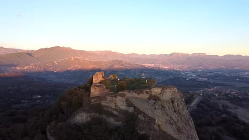 Drone shot orbiting Castle of Oris in Catalonia mountains in Spain