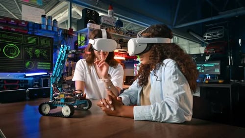 Young Adults Controlling Robot Arm with VR Headsets