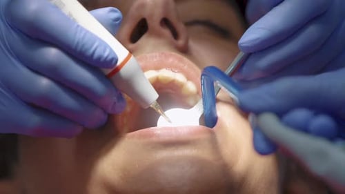 Dentistry concept. Patient sitting on dental chair in paediatric dentists office