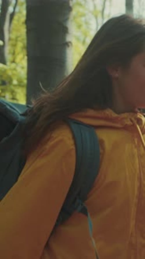 Smiling Duo Explores Wooded Trail Side By Side Joyful Married Pair Venture Through Forest with