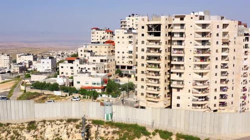 Security wall with Israeli idf watch tower Close to Anata Refugees Camp- Aerial