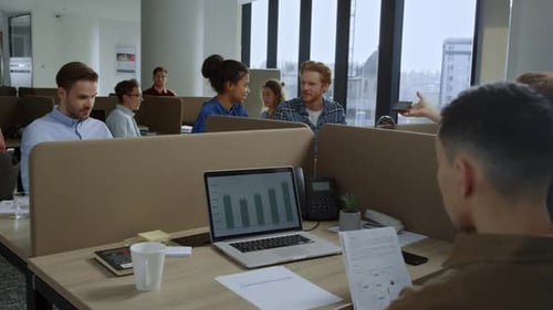 Team Working Together in Modern Corporate Office Space