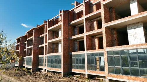 An Apartment Building Under Construction