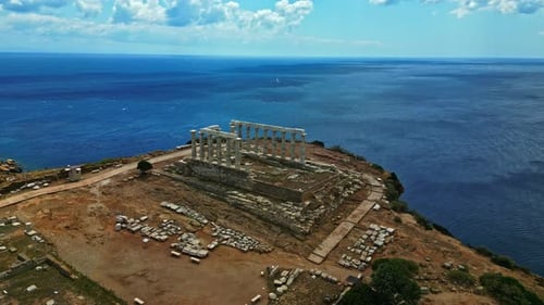 Aerial view away from the Archaeological Site of Sounion, sunny day in Greece