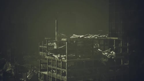 Ruins of a Once Vibrant Building in a Desolate Urban Landscape at Dusk